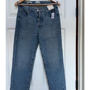 Universal Thread Women's Mid Rise 80’s slim leg, button fly light wash